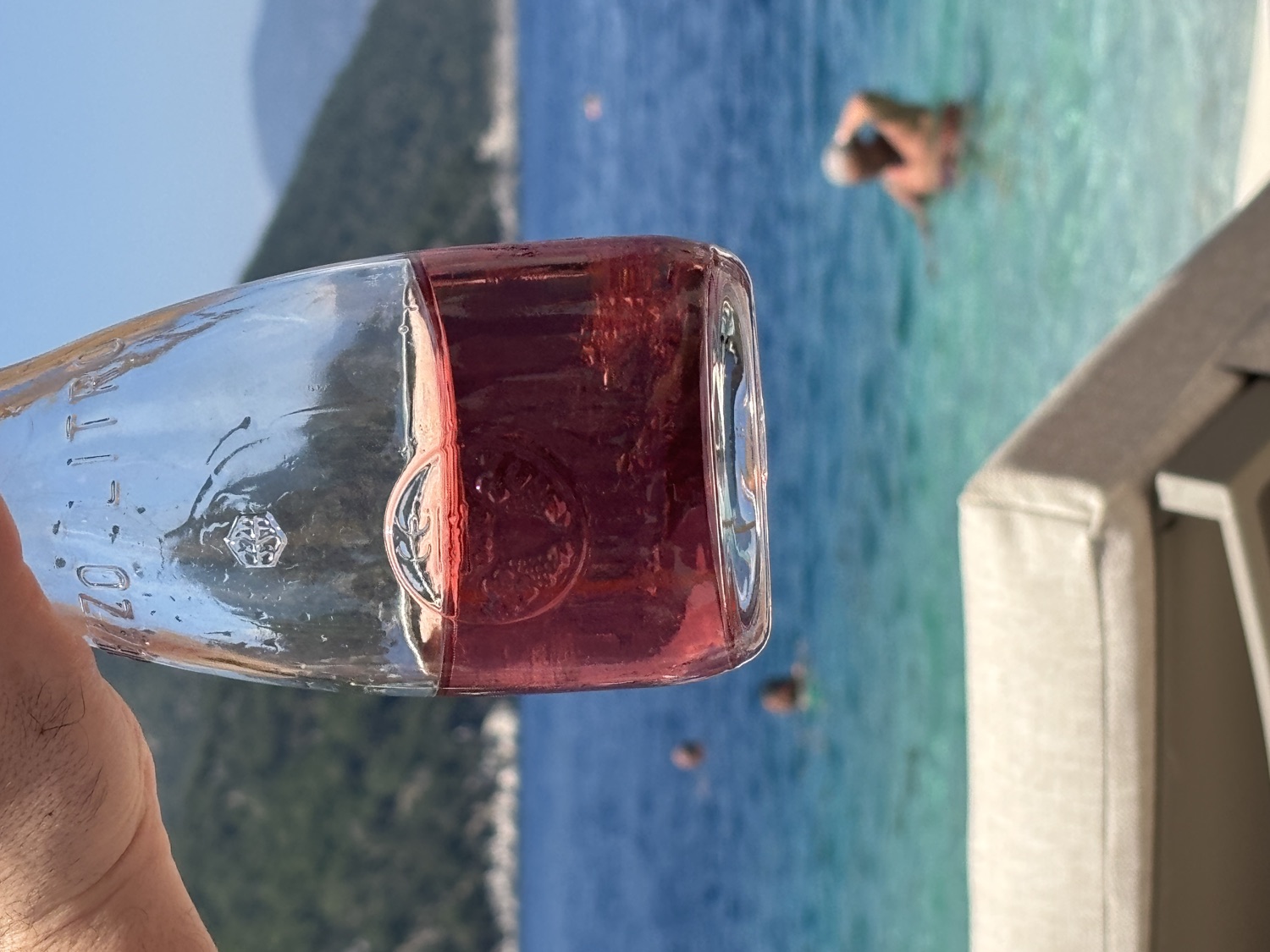Rosé in a carafe, facing the sea